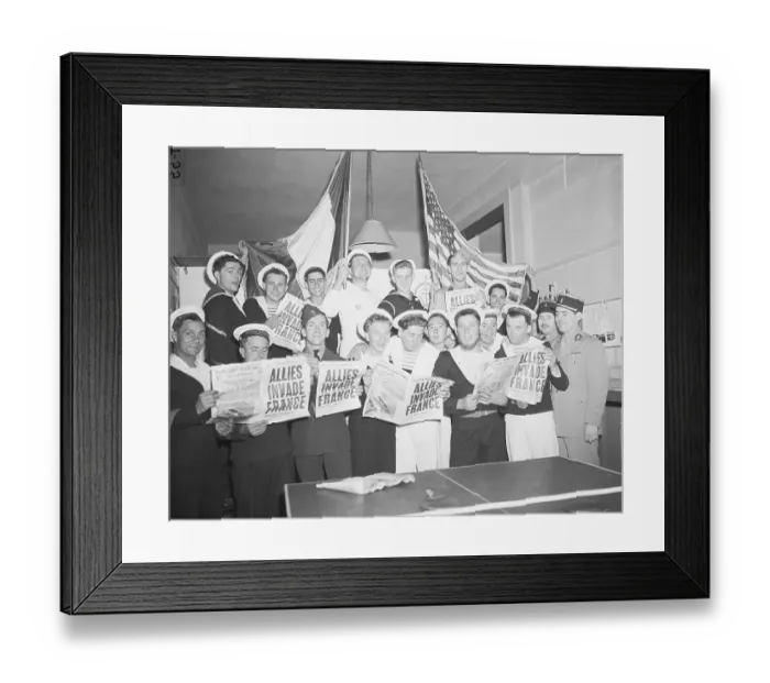 Framed Print : French Servicemen Read About D-Day