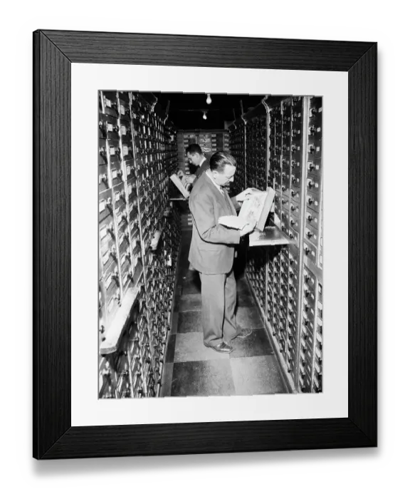 Framed Print : Attorney Looking Thru Patent Files Framed Print : Attorney Looking Thru Patent Files