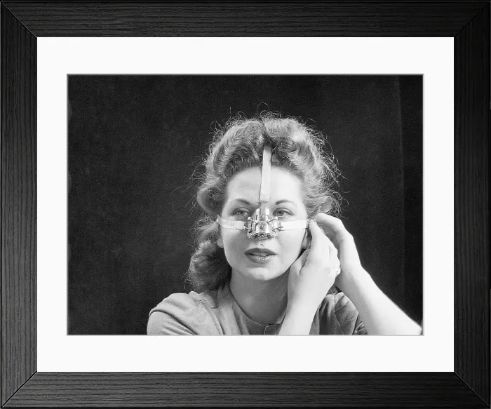 Framed Print : Woman Modeling Nose Shaping Device Framed Print : Woman Modeling Nose Shaping Device