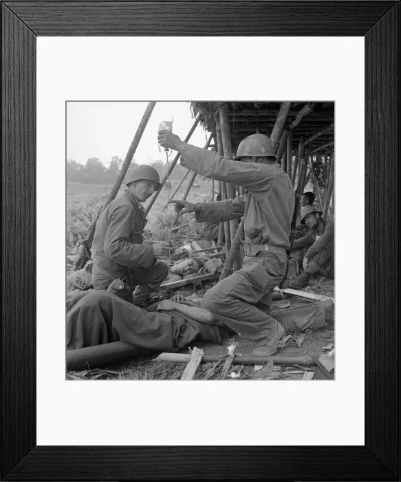 Framed Print : Us Soldier Gives Blood To Chinese Soldie Framed Print : Us Soldier Gives Blood To Chinese Soldie