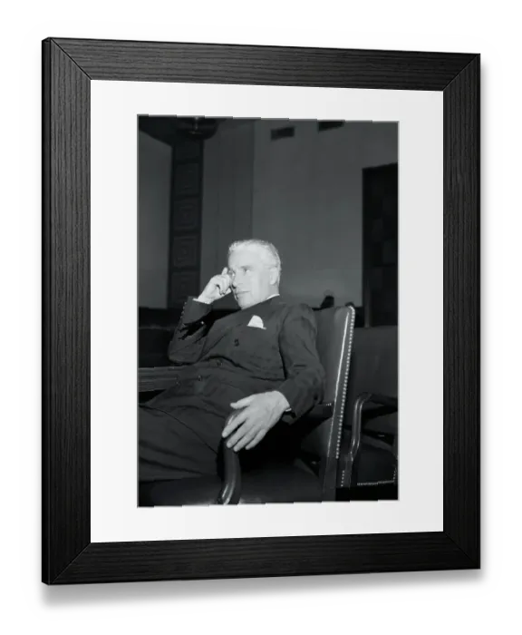 Framed Print : Charlie Chaplin Resting in a Chair Framed Print : Charlie Chaplin Resting in a Chair