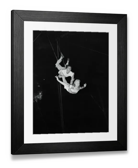 Framed Print : Trapeze Artists Practicing a Routine Framed Print : Trapeze Artists Practicing a Routine