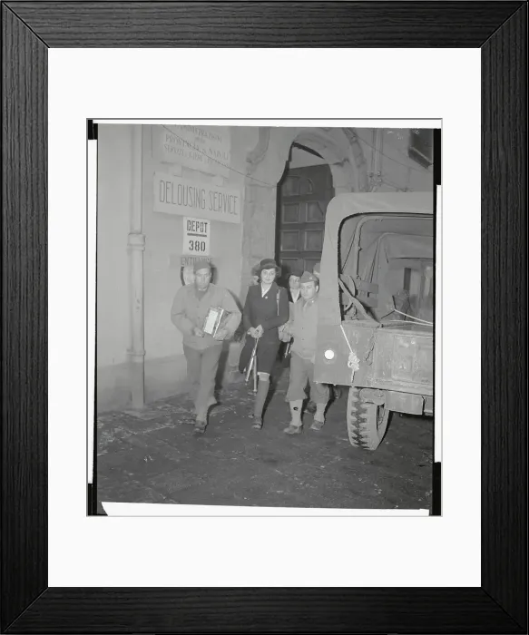 Framed Print : Medical Unit Members Walking Past Army Vehicle Framed Print : Medical Unit Members Walking Past Army Vehicle