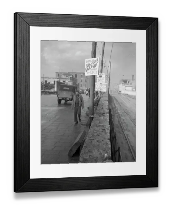 Framed Print : Private Walking Past Typhus Warning Sign on Street Framed Print : Private Walking Past Typhus Warning Sign on Street