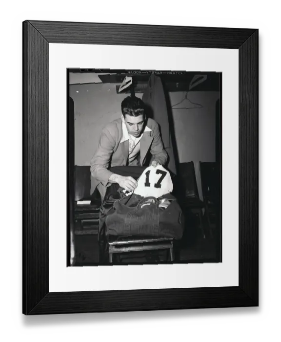 Framed Print : Otto Graham Placing Uniform Away Framed Print : Otto Graham Placing Uniform Away