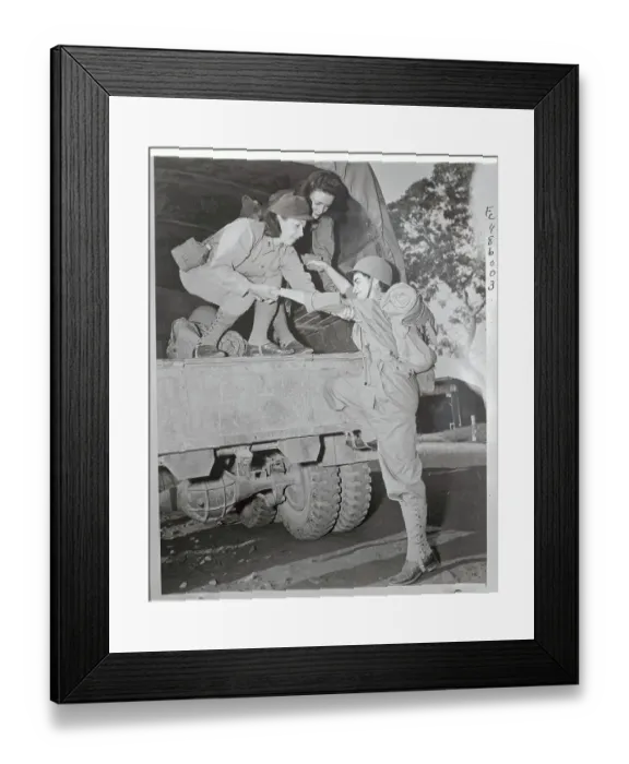 Framed Print : Female Soldier Boarding Truck Framed Print : Female Soldier Boarding Truck