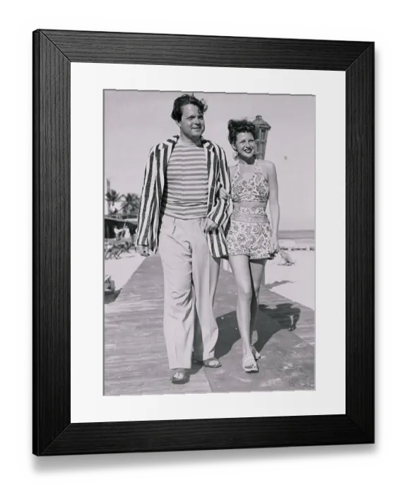 Framed Print : Orson Welles with Rita Hayworth Strolling Along Boardwalk Framed Print : Orson Welles with Rita Hayworth Strolling Along Boardwalk