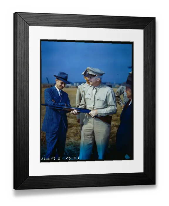 Framed Print : Henry H. Wilson Examining Rifle