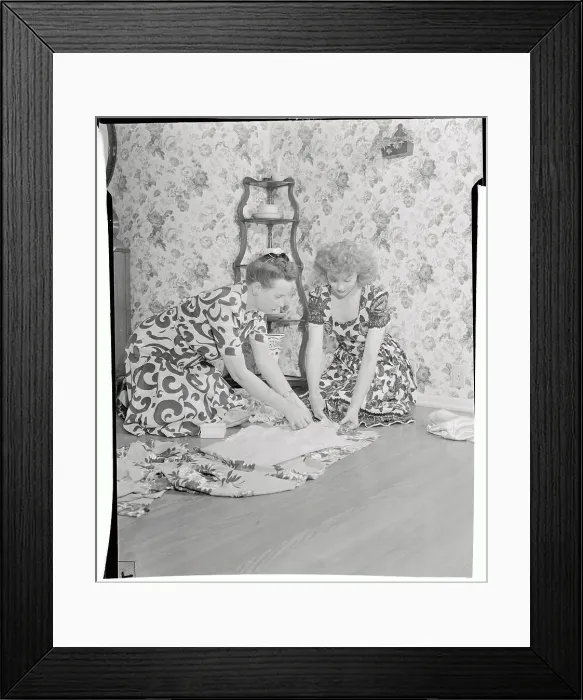 Framed Print : Lucille Ball Working at Table with Kerosene Lamps