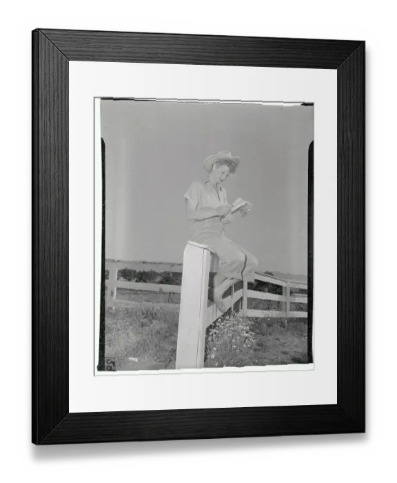 Framed Print : Lucille Ball Sitting on Fence and Reading Framed Print : Lucille Ball Sitting on Fence and Reading