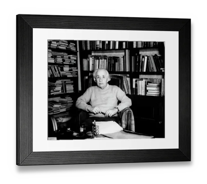 Framed Print : Albert Einstein Seated in Front of Bookcase Framed Print : Albert Einstein Seated in Front of Bookcase