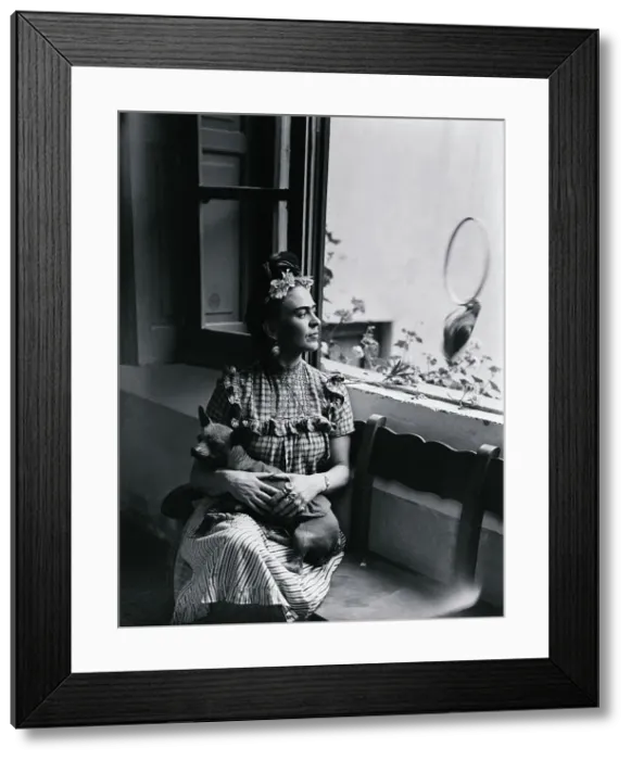 Framed Print : Frida Kahlo Holding her Dog Framed Print : Frida Kahlo Holding her Dog