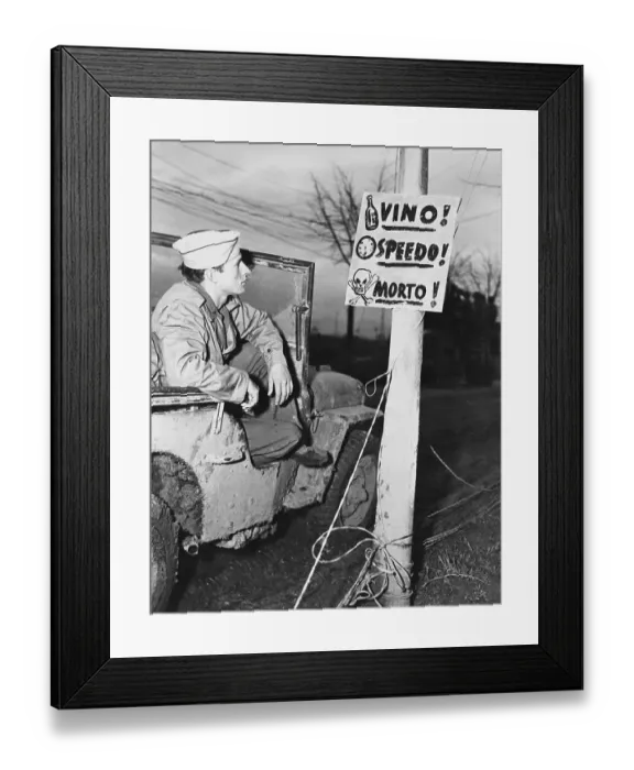Framed Print : Soldier Looking at Sign Framed Print : Soldier Looking at Sign