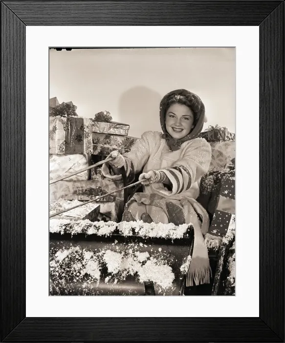 Framed Print : Anne Baxter Riding in Santa's Sleigh Framed Print : Anne Baxter Riding in Santa's Sleigh