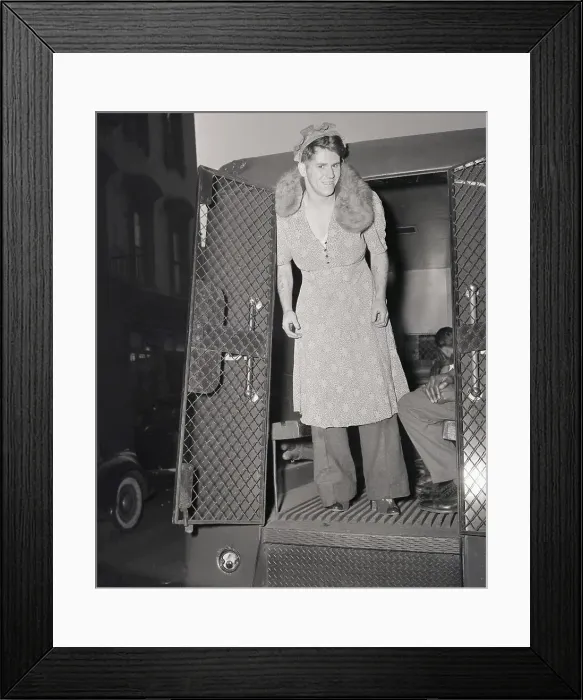 Framed Print : Cross-dressing Man Arrested for Robbery Framed Print : Cross-dressing Man Arrested for Robbery