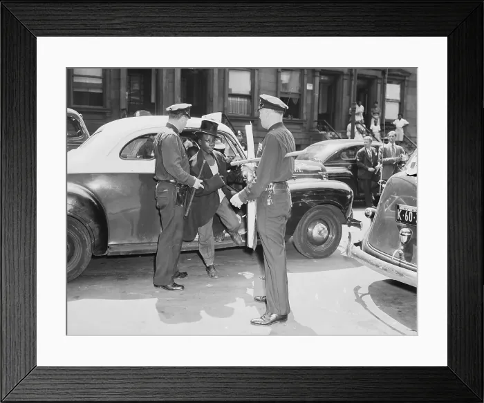 Framed Print : Young Black Man in Police Custody Framed Print : Young Black Man in Police Custody