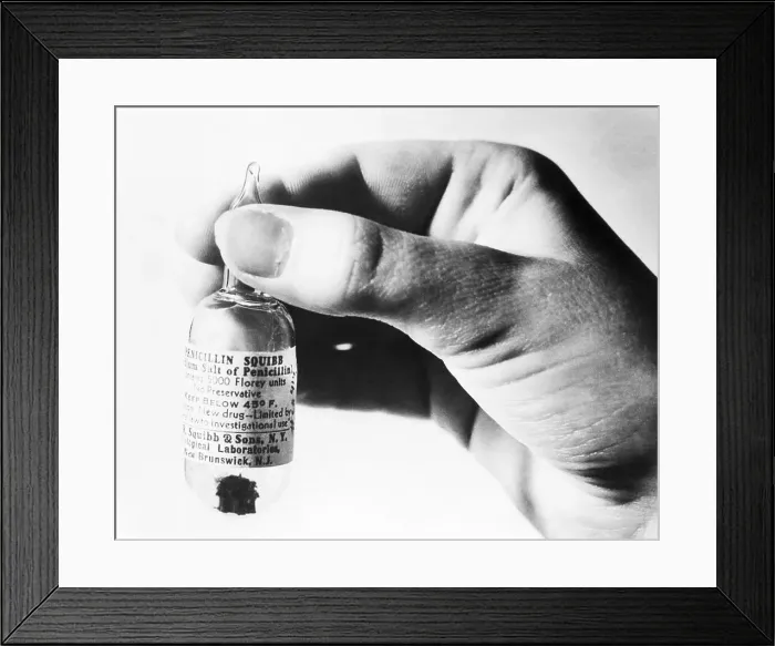Framed Print : Hand Holding Ampoule of Penicillin Framed Print : Hand Holding Ampoule of Penicillin