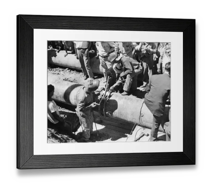 Framed Print : Welders Put Joint on Large Pipe