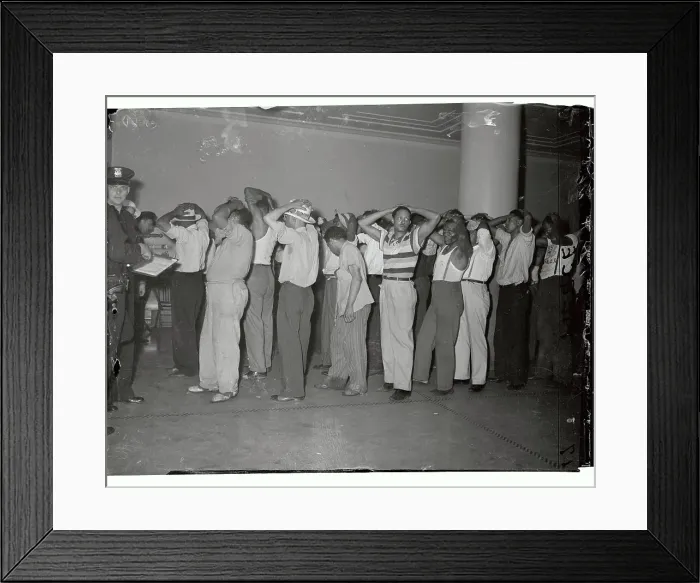 Framed Print : African Americans Being Searched at Courthouse