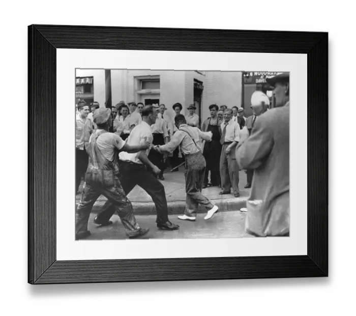 Framed Print : Man Trying to Escape Mob During Riot Framed Print : Man Trying to Escape Mob During Riot