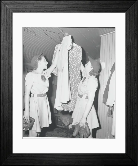 Framed Print : Female Baseball Players Hanging Dresses Framed Print : Female Baseball Players Hanging Dresses