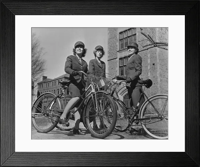 Framed Print : Three Female Marine Cadets Riding Bicycles Framed Print : Three Female Marine Cadets Riding Bicycles