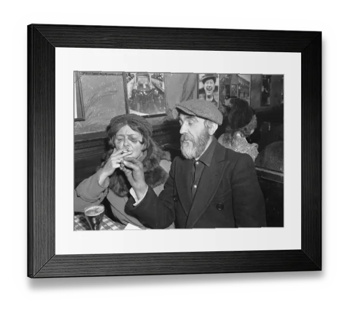 Framed Print : Man Helping Woman Light Cigarette Framed Print : Man Helping Woman Light Cigarette