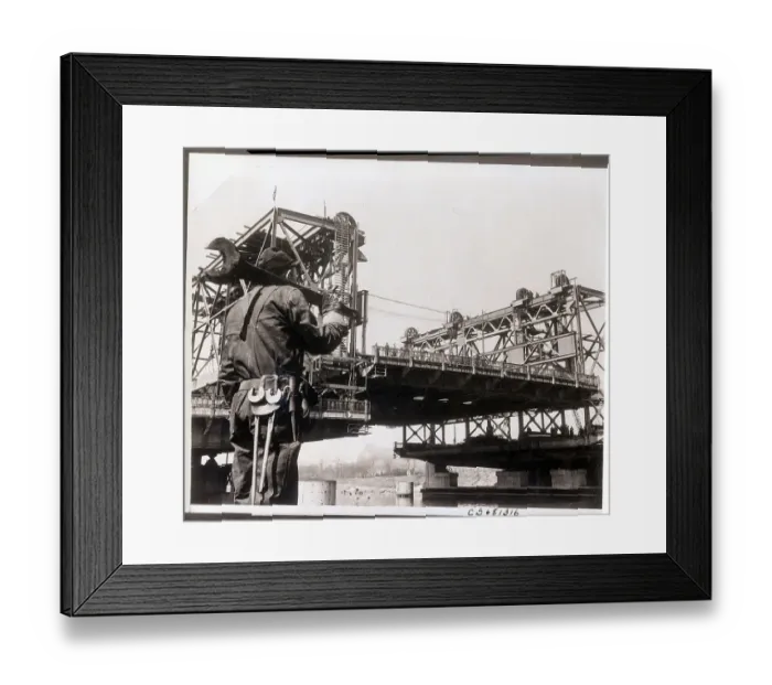 Framed Print : Worker with Large Wrench at Bridge Framed Print : Worker with Large Wrench at Bridge
