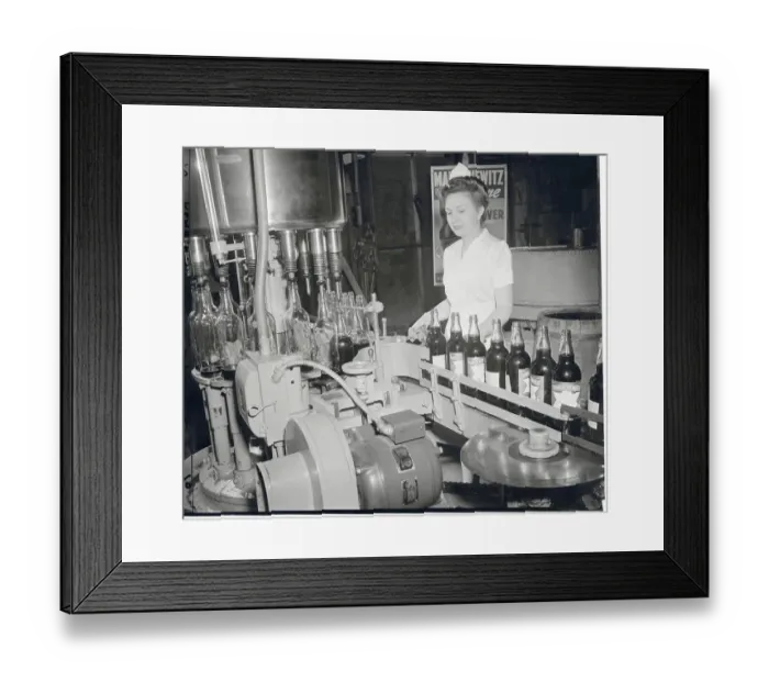 Framed Print : Woman Working at Bottling Factory Framed Print : Woman Working at Bottling Factory