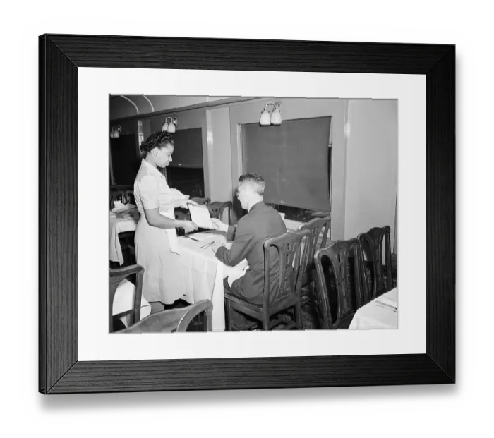 Framed Print : Waitress Presenting a Menu Framed Print : Waitress Presenting a Menu
