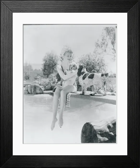 Framed Print : Comedienne Lucille Ball Playing with Dogs at Poolside Framed Print : Comedienne Lucille Ball Playing with Dogs at Poolside