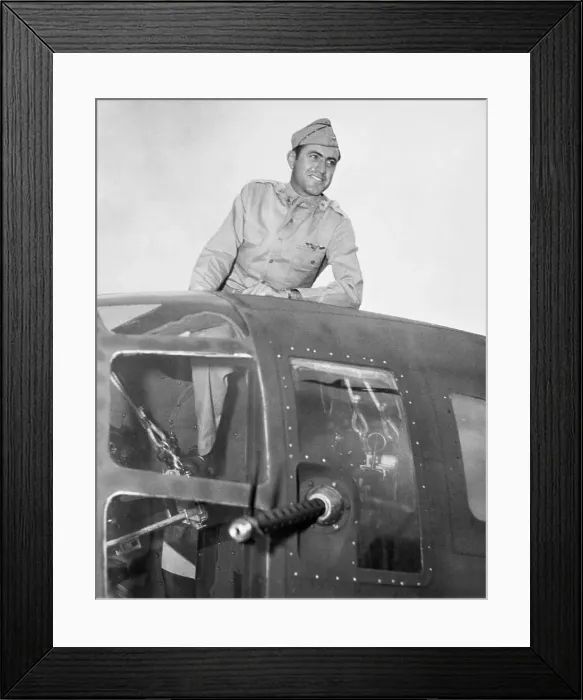 Framed Print : Lou Zamperini sitting climbing out of his bombardier hatch Framed Print : Lou Zamperini sitting climbing out of his bombardier hatch