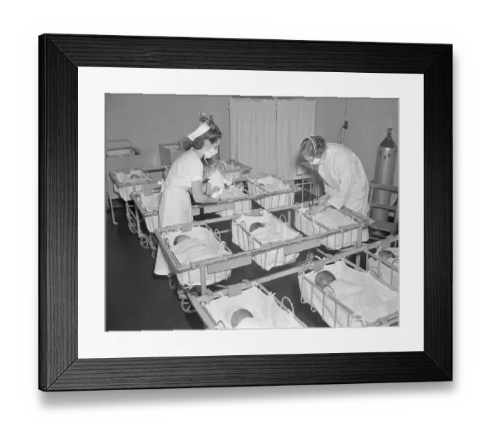 Framed Print : Students Caring for Babies Framed Print : Students Caring for Babies