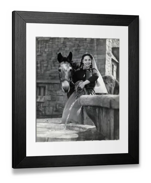 Framed Print : Actress Next To Donkey, Well; Movie Stil Framed Print : Actress Next To Donkey, Well; Movie Stil