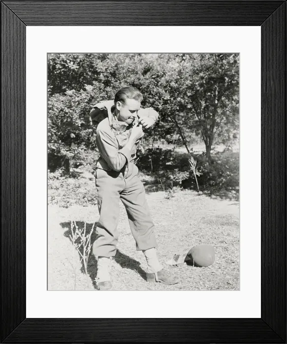 Framed Print : World War II Correspondent Carrying His Gear Through Forest Framed Print : World War II Correspondent Carrying His Gear Through Forest