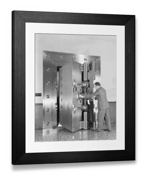 Framed Print : View Of Man Opening A Bank Vault Framed Print : View Of Man Opening A Bank Vault