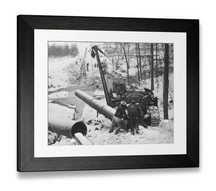 Framed Print : Workers Laying Oil Pipeline In Snowstorm Framed Print : Workers Laying Oil Pipeline In Snowstorm