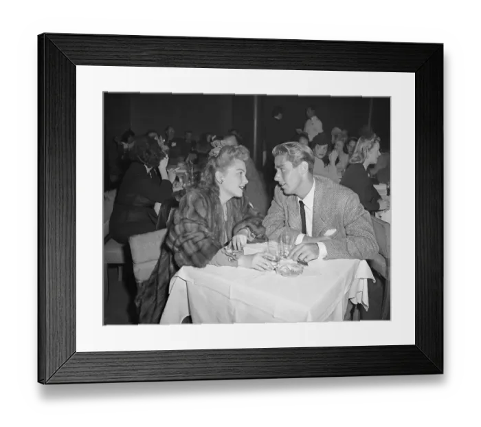 Framed Print : Ann Baxter And Peter Lawford At Table Framed Print : Ann Baxter And Peter Lawford At Table