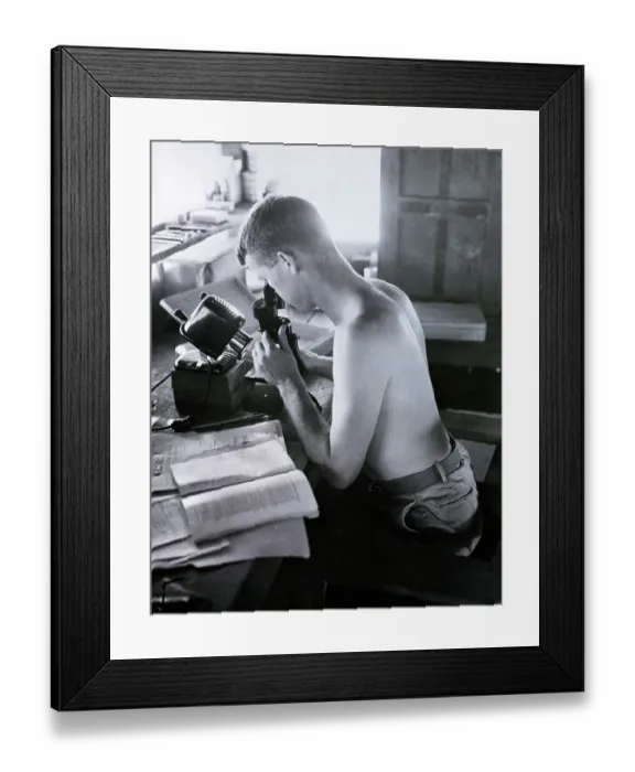 Framed Print : Shirtless Man Looking Into Microscope