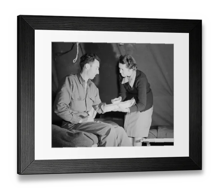 Framed Print : Army Nurse Applying Splint On Soldier Framed Print : Army Nurse Applying Splint On Soldier