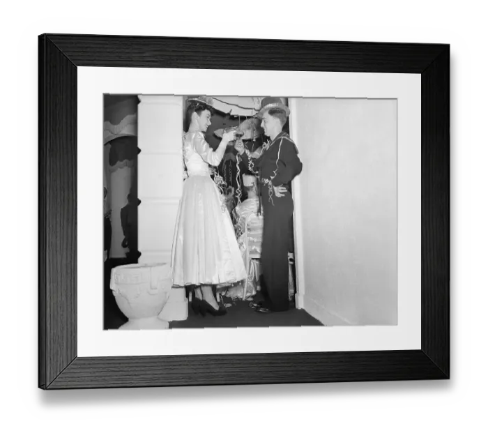 Framed Print : Couple Toasting the New Year Together Framed Print : Couple Toasting the New Year Together
