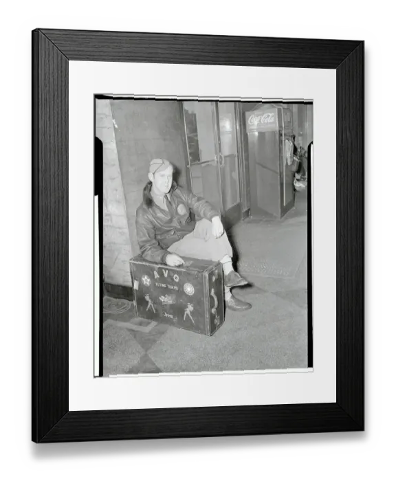 Framed Print : Jimmie Allard Sitting in Uniform With Suitcase