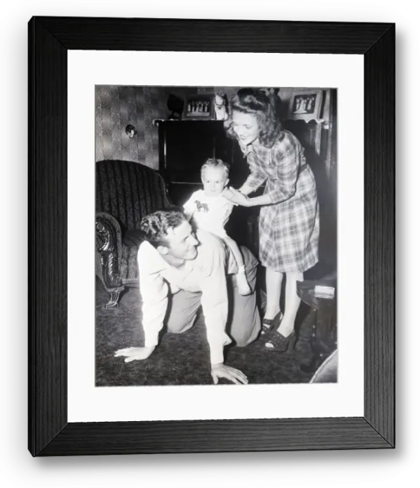 Framed Print : S.Musial W / Son On His Back & Wife Helps Framed Print : S.Musial W / Son On His Back & Wife Helps