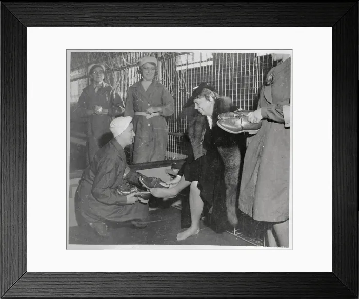 Framed Print : Eleanor Roosevelt Being Helped with Safety Shoes