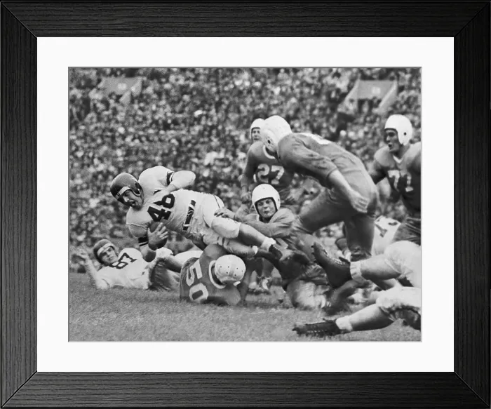 Framed Print : Otto Graham Leaping With Football