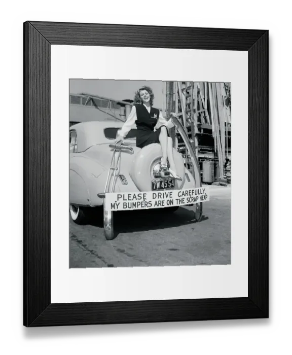Framed Print : Rita Hayworth Posing on Vehicle