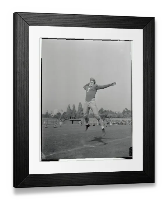 Framed Print : Bob Waterfield Jumping in the Air with Ball in Hand Framed Print : Bob Waterfield Jumping in the Air with Ball in Hand
