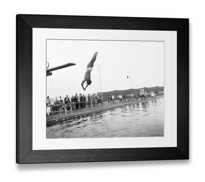 Framed Print : Sammy Lee, displays the form that won him the three meter diving event Framed Print : Sammy Lee, displays the form that won him the three meter diving event