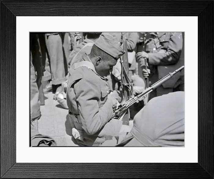 Framed Print : Black Soldier Cleaning Rifle Framed Print : Black Soldier Cleaning Rifle