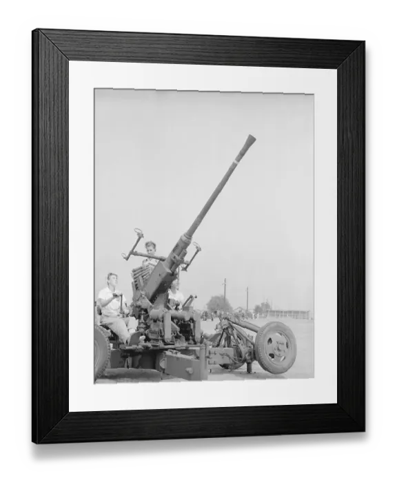 Framed Print : View of Woman Manning Antiaircraft Gun Framed Print : View of Woman Manning Antiaircraft Gun